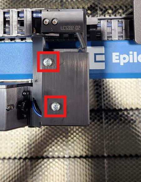 Beauty cover reinstalled and secured with screws