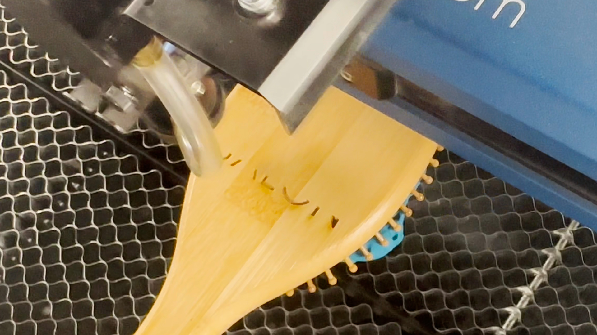 Laser engraving setup complete with wood item ready
