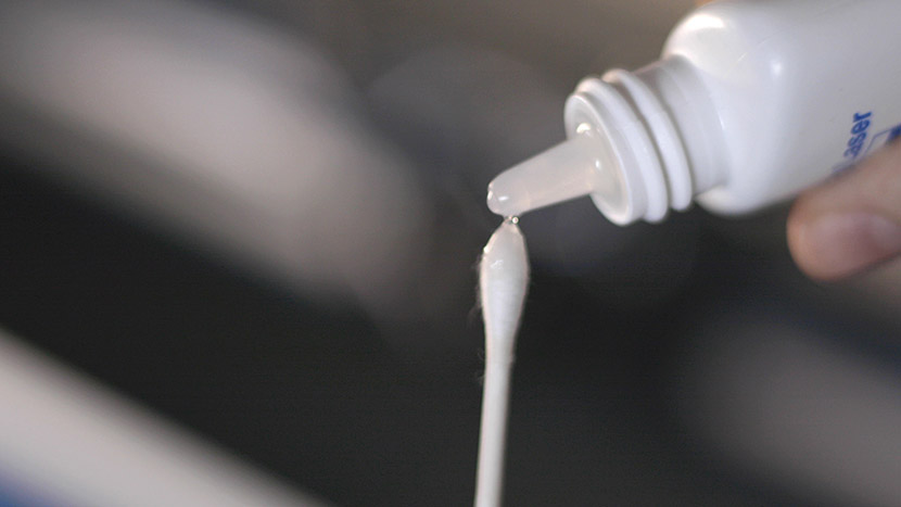 Applying lens cleaner