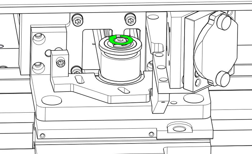 Tightening the screw on the new idler pulley