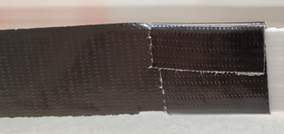 New and old belts taped together