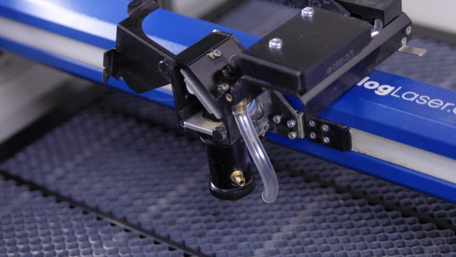 Close-up of hands working on a machine