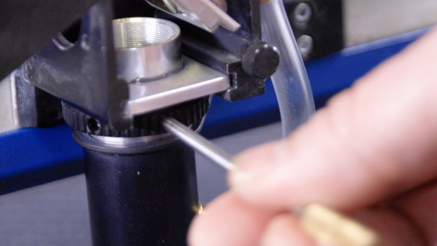 Close-up of a person using a tool