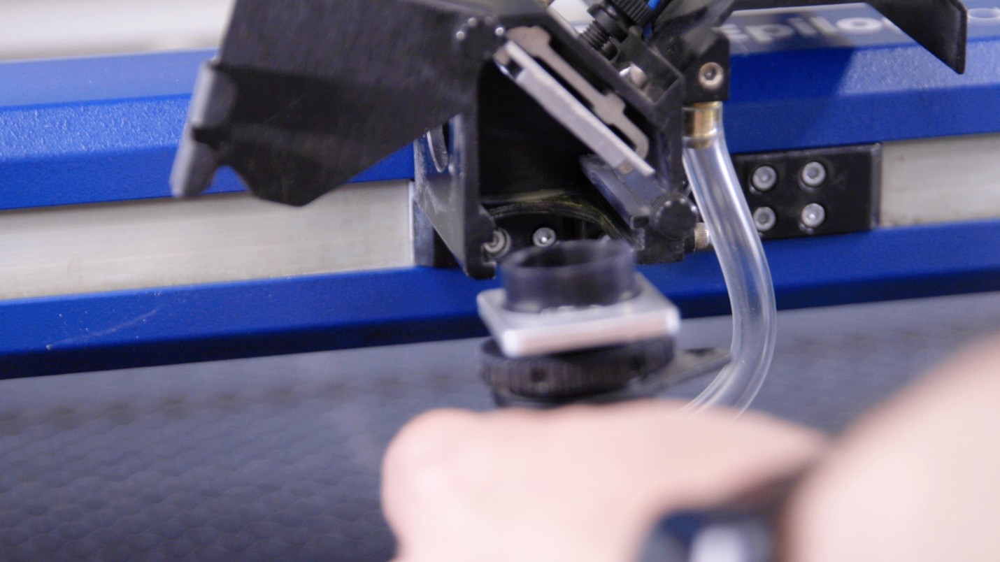 Close-up of a machine with a plastic tube