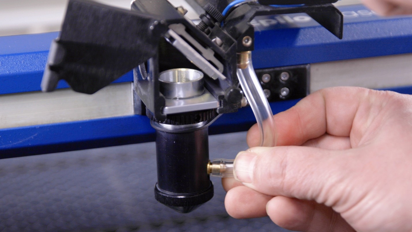 Close-up of a hand holding a tube
