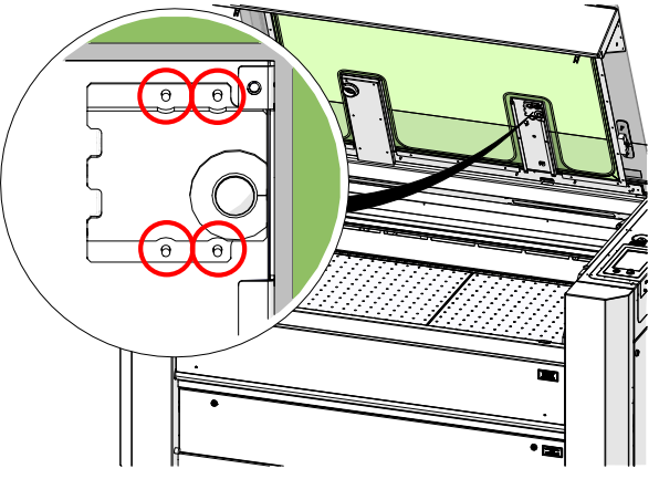 Loosening the four nuts with a nut driver.