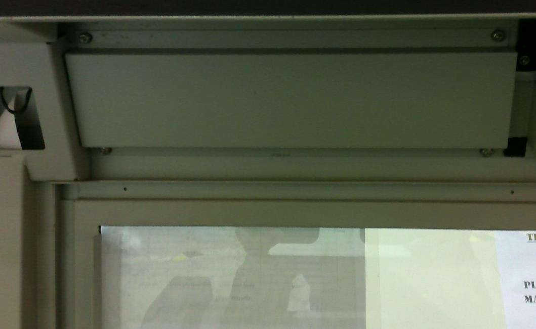 Two panels located on the machine's lid.