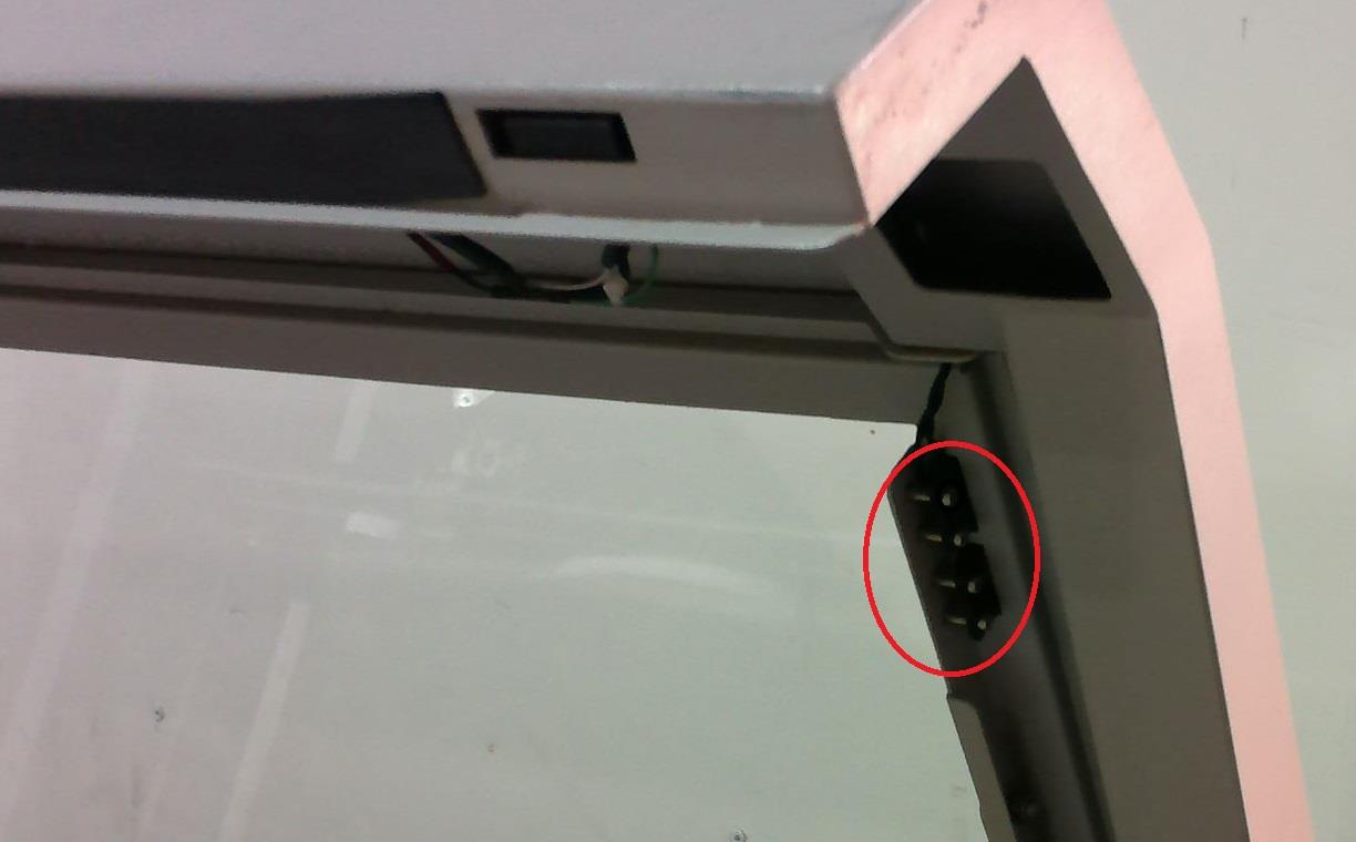 Close-up of the small black connector on the left side.