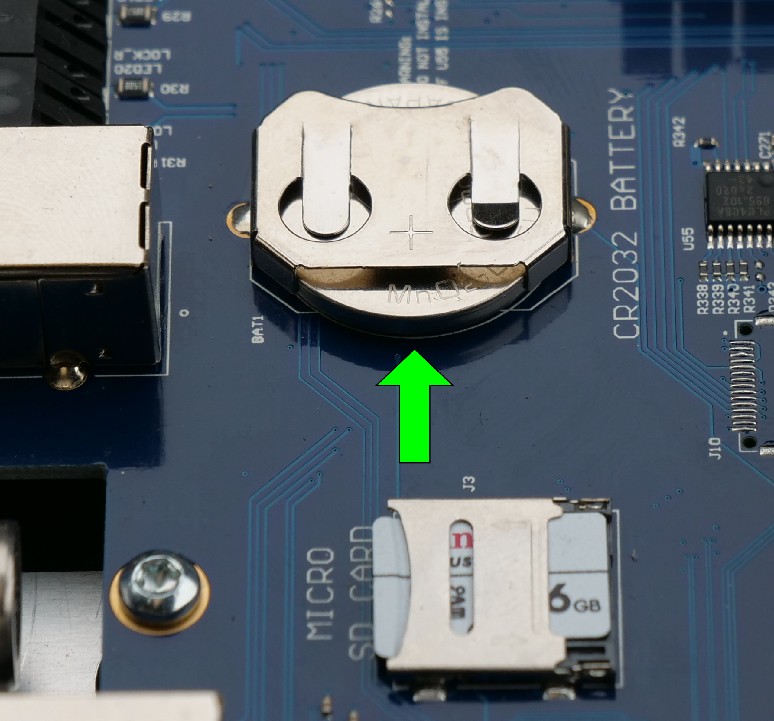 Location of SD Card and Coin Battery