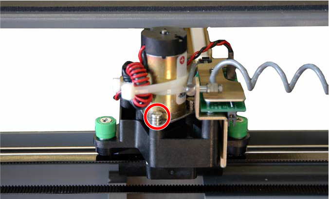 Location of one of the three captive mounting screws
