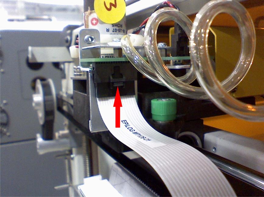 Disconnecting white ribbon cable