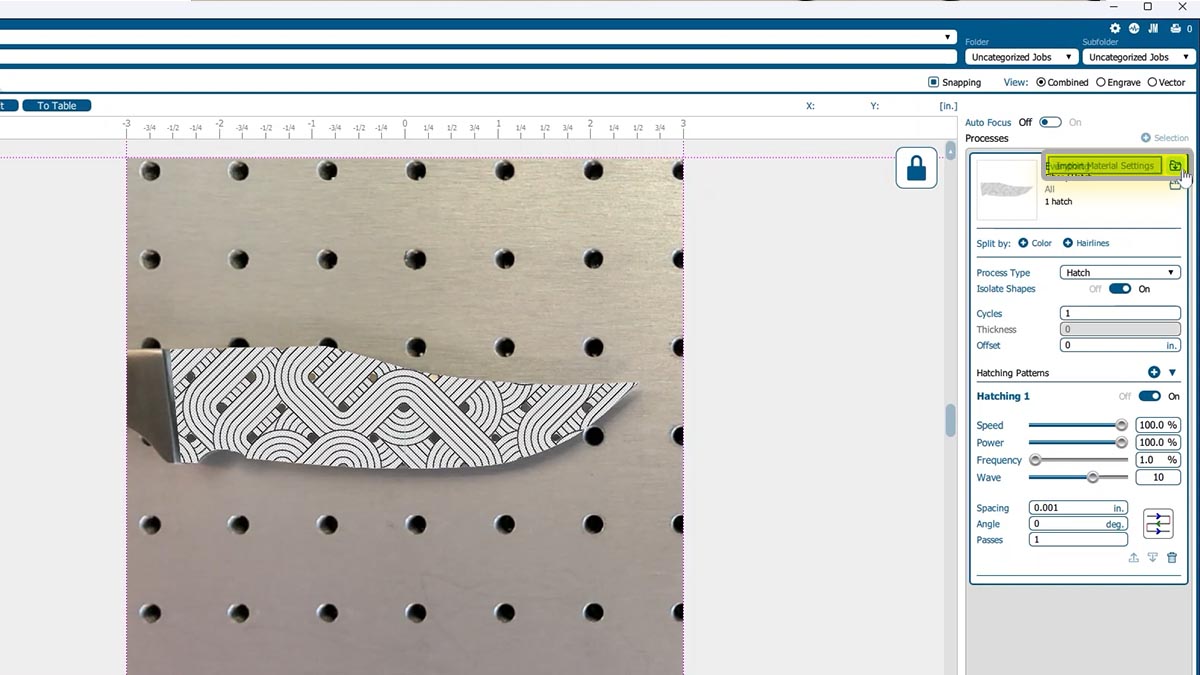 knife being laser engraved with the Epilog Fusion Galvo with camera